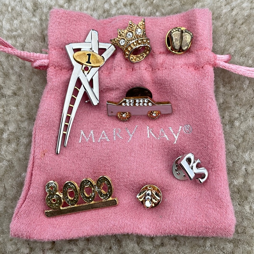 Various Mary Kay accolade pins